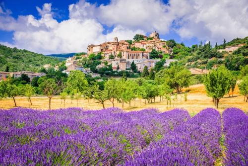 Simiane-la-Rotonde, hilltop village in Provence with lavender fields, France.